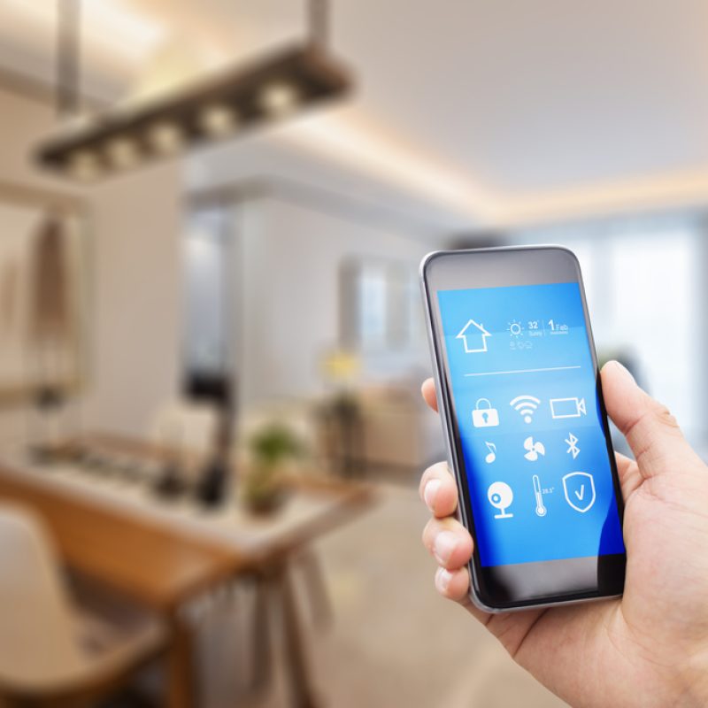 Mobile,Phone,With,Apps,On,Smart,Home,In,Modern,Dining